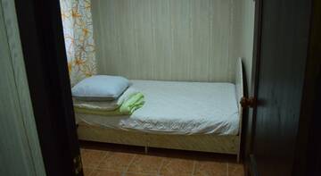 Фото номера Стандартный семейный номер Гостиница Guest House on Pirogova st. г. Волгоград 5