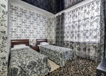 Фото номера Номер стандарт с 2 односпальными кроватями Гостиница Frant Palace г. Волгоград 2