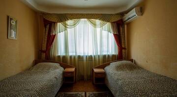 Фото номера Стандартный двухместный номер с 2 отдельными кроватями Гостиница Аэропорт Волгоград г. Волгоград 3