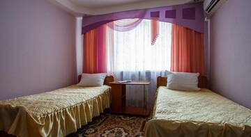 Фото номера Стандартный двухместный номер с 2 отдельными кроватями Гостиница Аэропорт Волгоград г. Волгоград 4