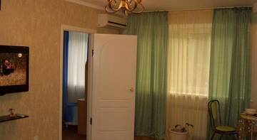 Фото номера Апартаменты с 3 спальнями Гостиница on Parhomenko st. г. Волгоград 5
