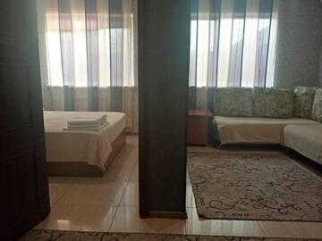 Фото номера Классический четырехместный номер Гостиница Guest house Shturman г. Волгоград 14