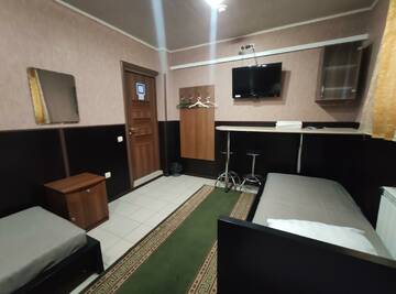 Фото номера Номер стандарт эконом с 3 односпальными кроватями Гостиница МотоСтоп г. Волгоград 4