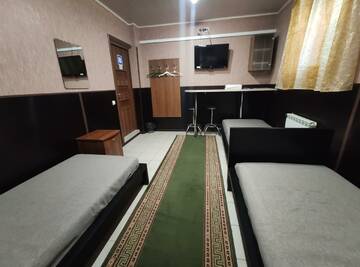 Фото номера Номер стандарт эконом с 3 односпальными кроватями Гостиница МотоСтоп г. Волгоград 6