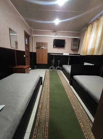 Фото номера Бюджетный трехместный номер Гостиница МотоСтоп г. Волгоград 3