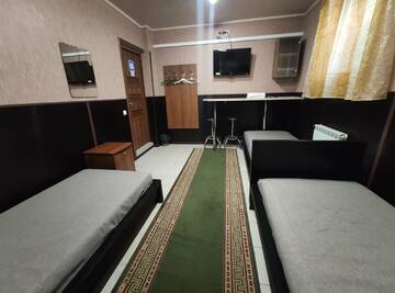 Фото номера Бюджетный трехместный номер Гостиница МотоСтоп г. Волгоград 6
